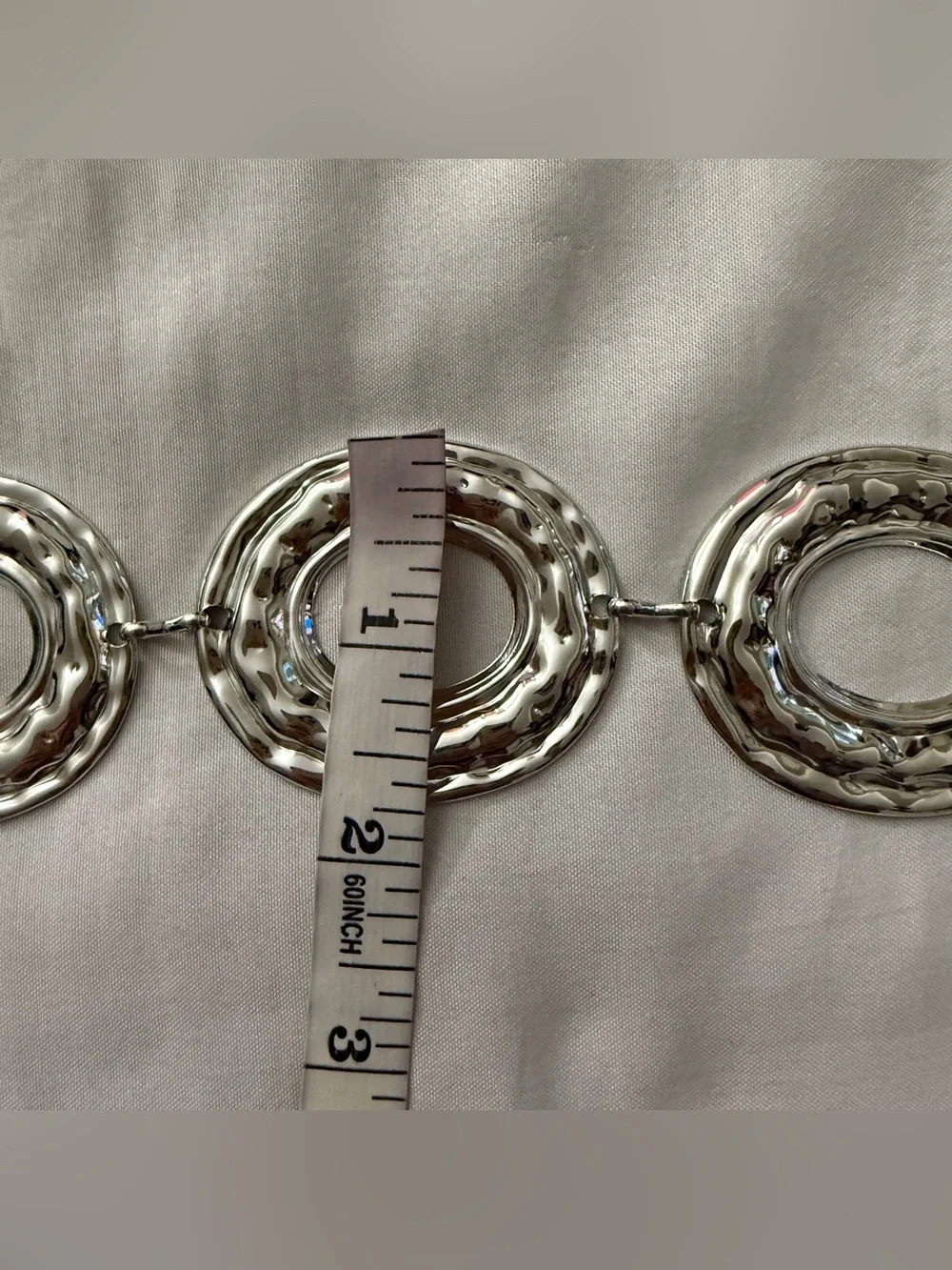 Silver tone metallic disc chain belt